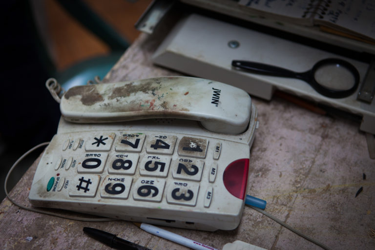 Lennart Anderson studio interior dirty phone on work table