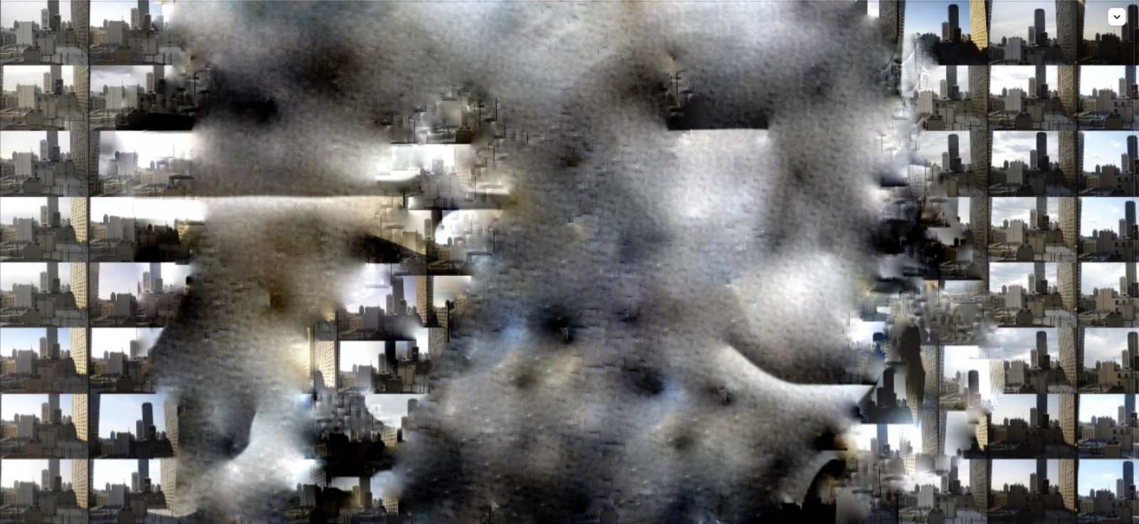 In this photograph, tiny images of the same cityscape repeat across several columns and rows, with the central portion of the whole obscured by a wet-looking blot.