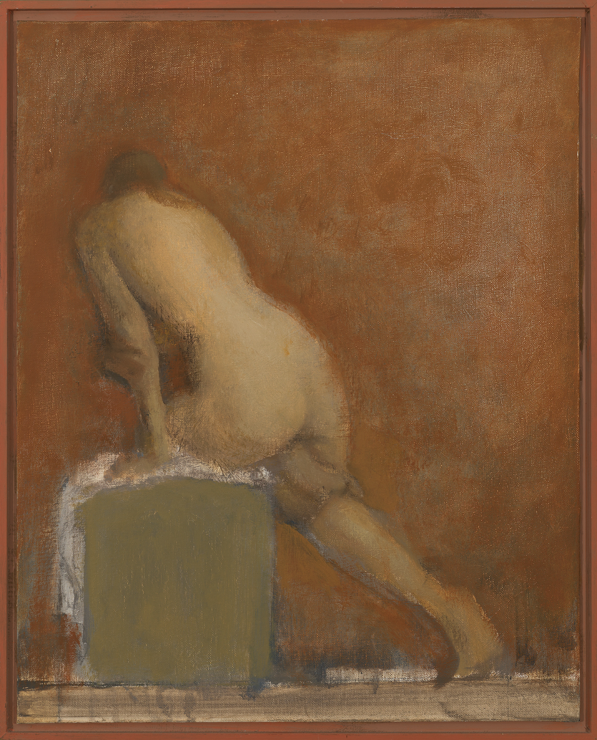 A nude woman is posed with her back to us. The left side of her body is perched on a box; her left buttock and thigh visible, her left arm supporting the weight of her shoulders and upper body, palm of her hand pressing against the top of the box. Her right leg stretches out behind her to the right. Her head is tilted down and away so that we see only the back of her head.